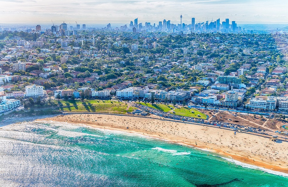 Aerial view of Bondi Beach and Sydney skyline