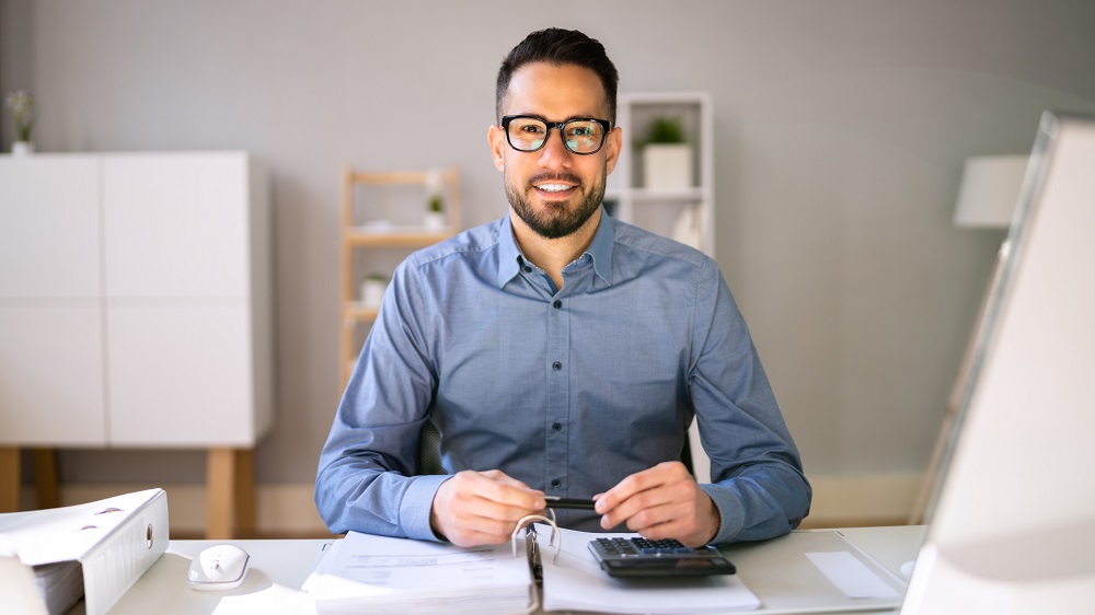 Professional buyers agent consulting with clients about property purchasing and service costs.