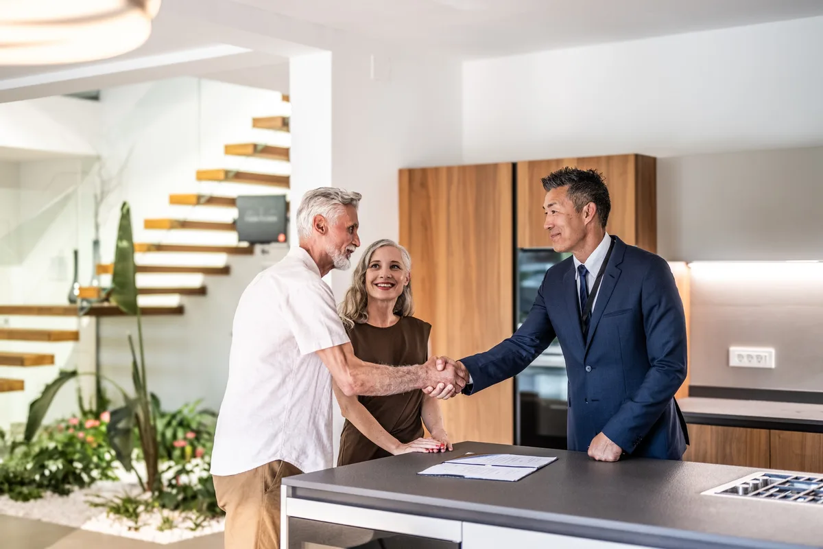 Retired couple at home in Australia considering a reverse mortgage