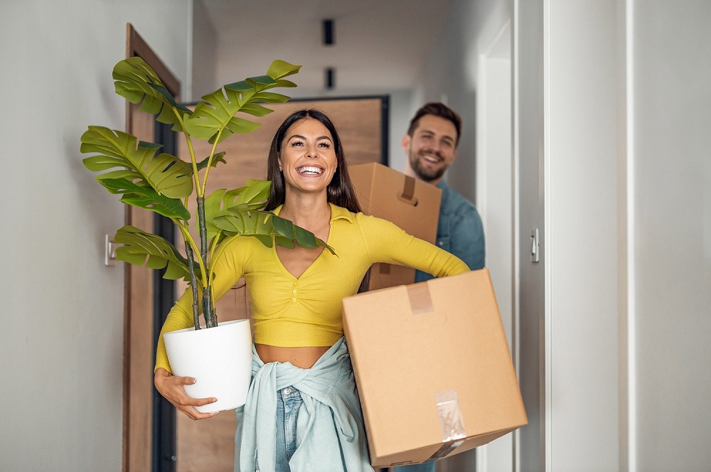 Self-employed borrowers moving into their new home after securing a mortgage in Australia.